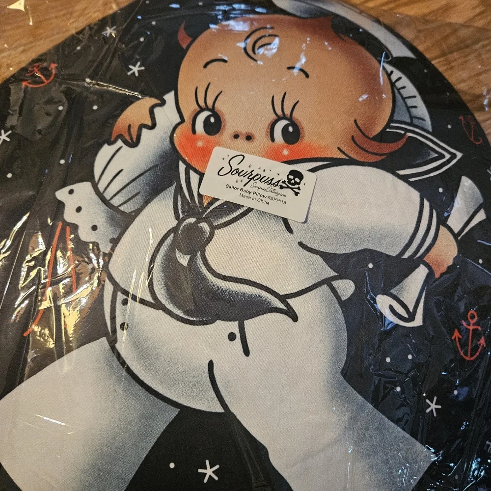 Sourpuss baby sailor, buoy boy, nautical navy pillow. Punk Kitsch Rockabilly